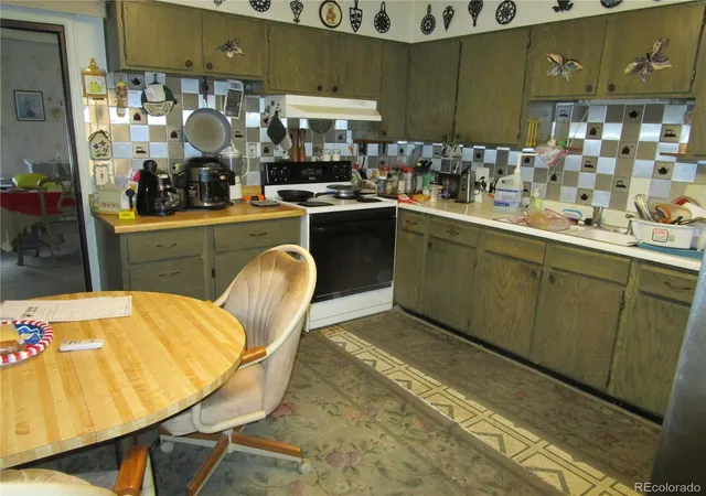 5th image of 11930 E Exposition Ave, Aurora, CO 80012 | MLS# 8958482
