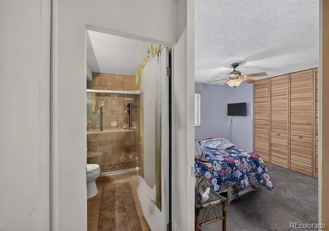 Listing Photo 5 - Condo for sale in building located at 9380 E Ctr Ave, Denver, CO 80247 - Unit #1B