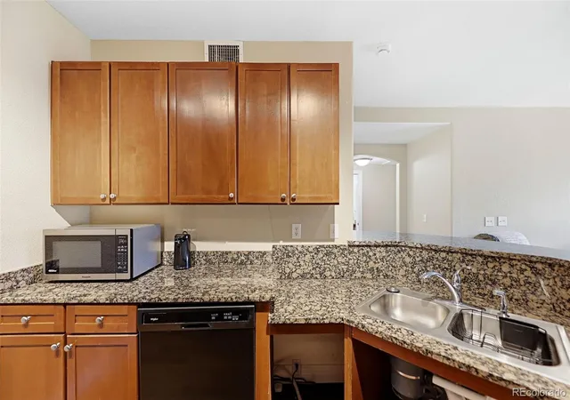 Photo 3 of Condo for sale at 9059 E Panorama Cir #B111, Englewood, CO 80112 | MLS# 7061035 | Listing updated on 2026-10-07
