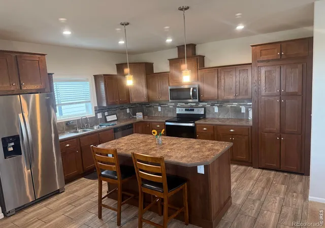 4th image of 329 Yellowstone Ave, Brush, CO 80723 | MLS# IR1067137