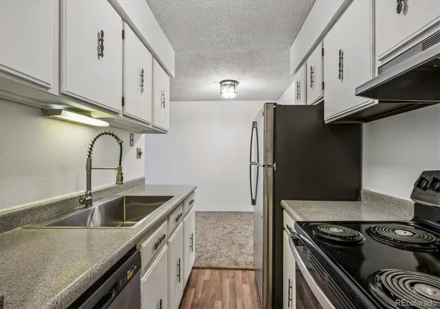 Photo 2 of Condo for sale at 7455 E Quincy Ave #107, Denver, CO 80237 | MLS# 9644090 | Listing updated on 2026-08-26