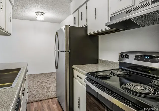 Photo 3 of Condo for sale at 7455 E Quincy Ave #107, Denver, CO 80237 | MLS# 9644090 | Listing updated on 2026-10-02