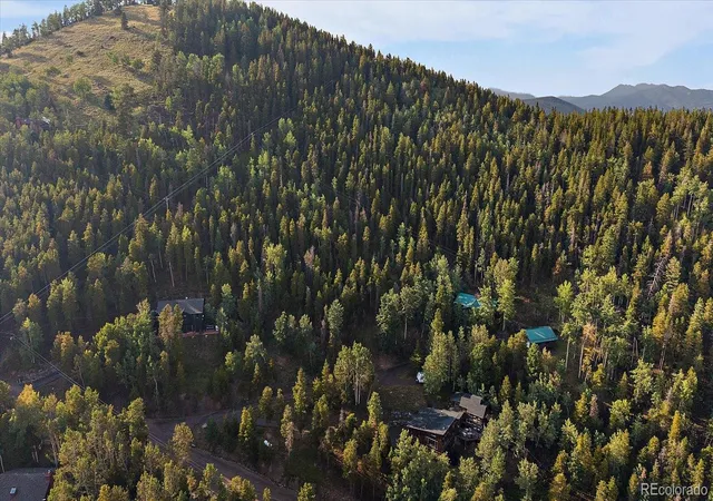 Photo 3 of Single family home for sale at 66 Lodgepole Cir, Evergreen, CO 80439 | MLS# 8574413 | Listing updated on 2026-08-31