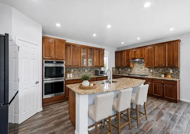 Photo 2 of Single family home for sale at 10696 Nucla St, Commerce City, CO 80022 | MLS# 2129283 | Listing updated on 2026-10-09