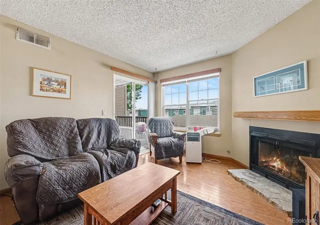 Listing Photo 2 - Condo for sale in building located at 5706 W Asbury Pl, Lakewood, CO 80227 - Unit #202