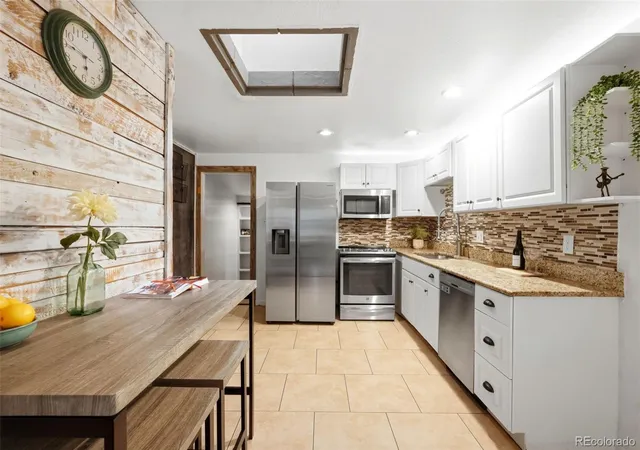 Photo 3 of Single family home for sale at 902 S Ironton St, Aurora, CO 80012 | MLS# 7543377 | Listing updated on 2026-10-21