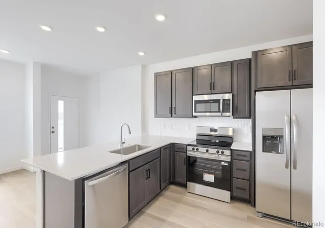 Photo 4 of Townhouse for sale at 403 N Bently St, Watkins, CO 80137 | MLS# 5155359 | Listing updated on 2026-09-27