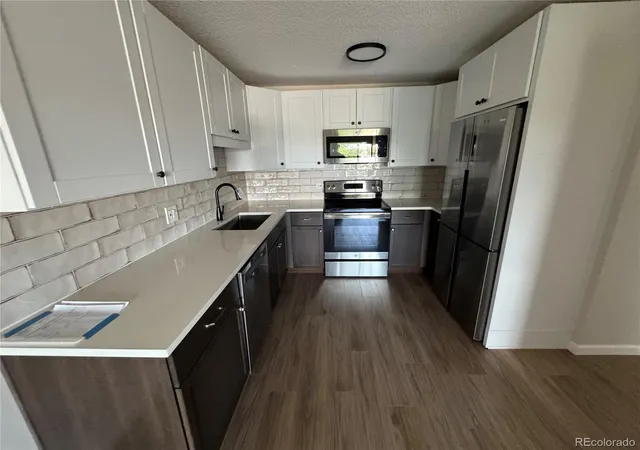 Photo 4 of Condo for sale at 495 S Dayton St #1C, Denver, CO 80247 | MLS# 7012925 | Listing updated on 2026-08-26