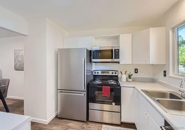 Photo 4 of Townhouse for sale at 7755 E Quincy Ave #T6, Denver, CO 80237 | MLS# 7701194 | Listing updated on 2026-10-20