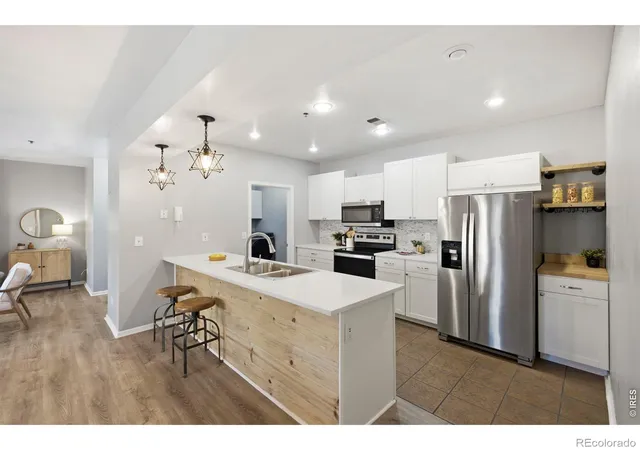 Listing Photo 2 - Condo for sale in building located at 4501 Regency Dr, Fort Collins, CO 80526 - Unit #D