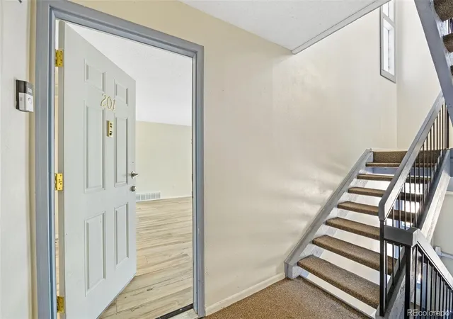 Listing Photo 2 - Condo for sale in building located at 12191 Melody Dr, Westminster, CO 80234 - Unit #201