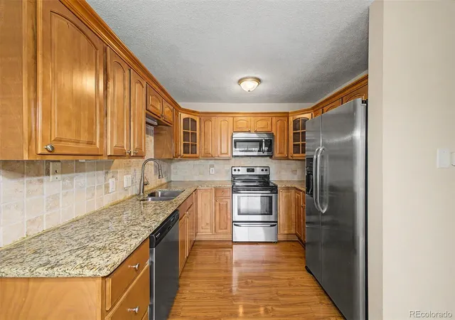 Photo 3 of Condo for sale at 9335 E Center Ave #9B, Denver, CO 80247 | MLS# 1965175 | Listing updated on 2026-08-28