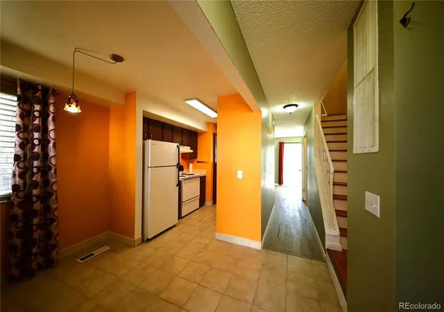Photo 1 of Townhouse for sale at 12056 E 25th Ave, Aurora, CO 80010 | MLS# 2002687 | Listing updated on 2026-10-12