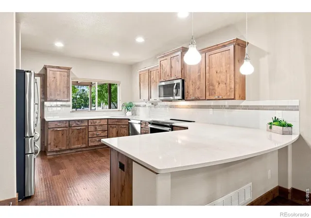 Photo 3 of Townhouse for sale at 1974 Pikes Peak Dr, Loveland, CO 80538 | MLS# IR1067563 | Listing updated on 2026-10-04