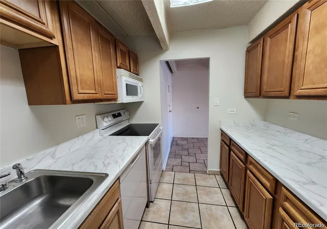 Photo 3 of Condo for sale at 8060 E Girard Ave #210, Denver, CO 80231 | MLS# 7994134 | Listing updated on 2026-08-30