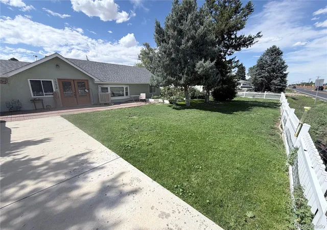 Photo 2 of Single family home for sale at 1663 Monroe St, Strasburg, CO 80136 | MLS# 3886704 | Listing updated on 2026-08-31