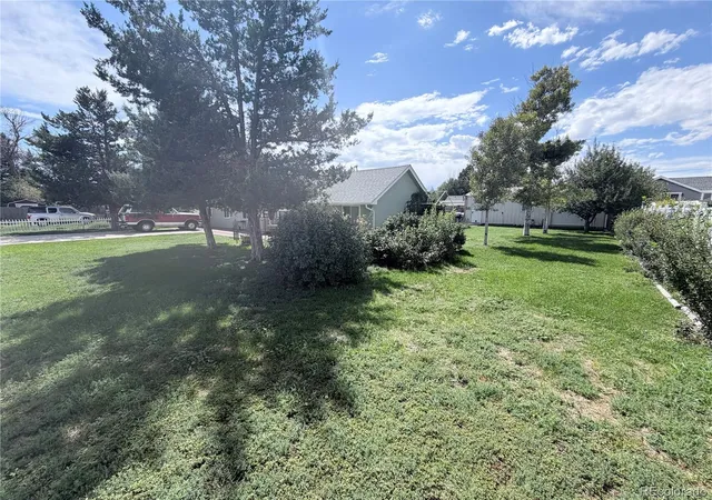 Photo 3 of Single family home for sale at 1663 Monroe St, Strasburg, CO 80136 | MLS# 3886704 | Listing updated on 2026-08-31