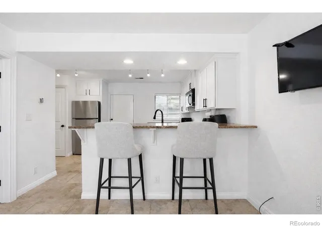 Photo 3 of Townhouse for sale at 3321 Eliot St, Denver, CO 80211 | MLS# IR1067597 | Listing updated on 2026-09-01