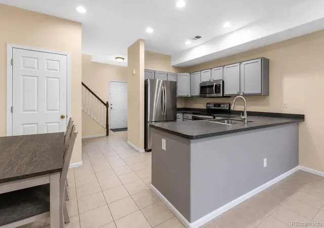 Photo 2 of Townhouse for sale at 2143 Coronado Pkwy N #C, Denver, CO 80229 | MLS# 7396116 | Listing updated on 2026-09-30
