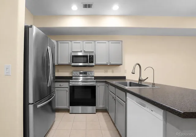 Photo 3 of Townhouse for sale at 2143 Coronado Pkwy N #C, Denver, CO 80229 | MLS# 7396116 | Listing updated on 2026-09-30