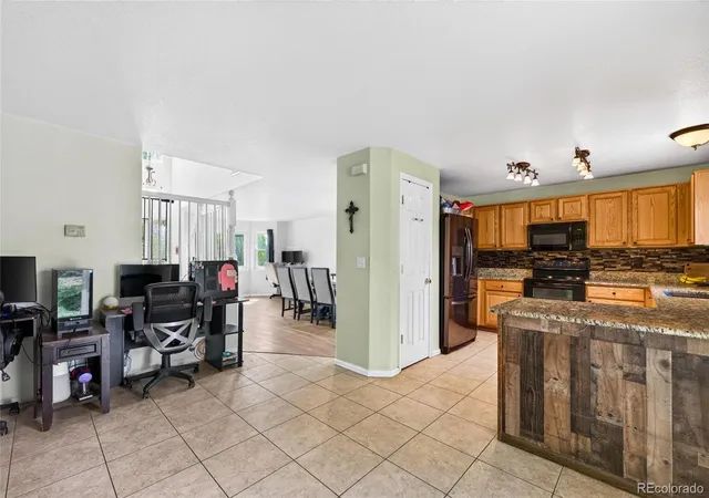 Photo 4 of Single family home for sale at 13909 Dahlia St, Thornton, CO 80602 | MLS# 7160689 | Listing updated on 2026-09-25