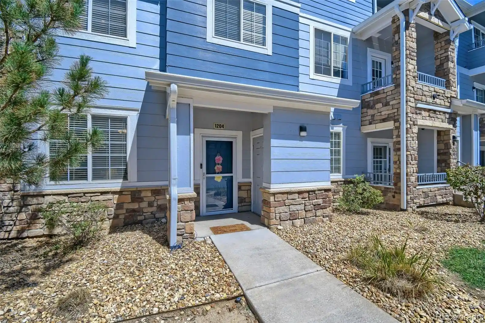 Listing Photo 2 - Condo for sale in 5255 Memphis St located at 5255 Memphis St, Denver, CO 80239 - Unit #1204