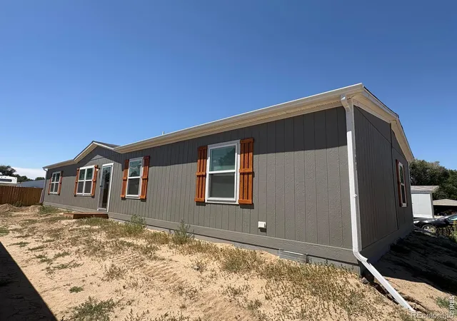 Photo 2 of Single family home for sale at 103 Beach Dr, Log Lane Village, CO 80705 | MLS# IR1067660 | Listing updated on 2026-09-26