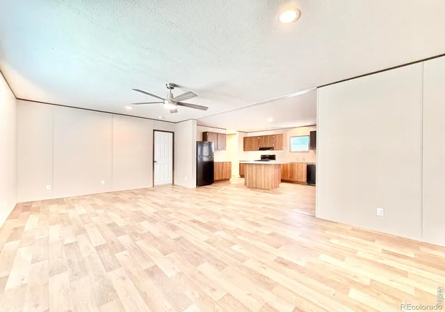 Photo 3 of Single family home for sale at 103 Beach Dr, Log Lane Village, CO 80705 | MLS# IR1067660 | Listing updated on 2026-09-26
