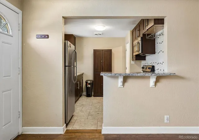 Photo 3 of Single family home for sale at 3216 Pontiac St, Denver, CO 80207 | MLS# 7516458 | Listing updated on 2026-10-06