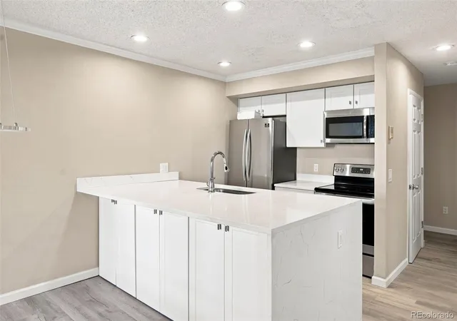 Listing Photo 3 - Condo for sale in building located at 5770 E Warren Ave, Denver, CO 80222 - Unit #104