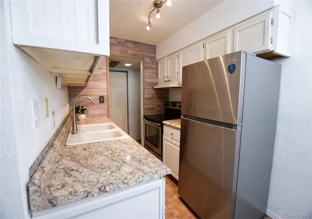 Photo 3 of Condo for sale at 7755 E Quincy Ave #107, Denver, CO 80237 | MLS# 4696948 | Listing updated on 2026-09-13