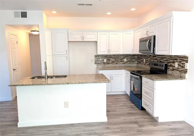 Photo 1 of Condo for sale at 1614 Granby Way #103, Aurora, CO 80011 | MLS# 2626966 | Listing updated on 2026-10-16