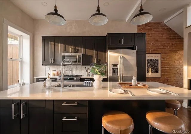 Photo 2 of Townhouse for sale at 2753 Champa St, Denver, CO 80205 | MLS# 7324242 | Listing updated on 2026-09-17