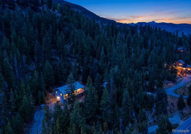 Photo 1 of Single family home for sale at 990 Saddleback Dr, Evergreen, CO 80439 | MLS# 8274076 | Listing updated on 2026-09-05