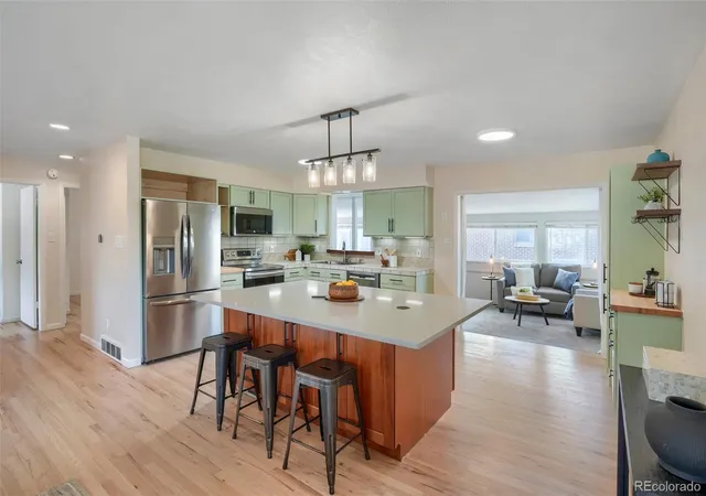 Photo 3 of Single family home for sale at 1323 S Dudley St, Lakewood, CO 80232 | MLS# 2275418 | Listing updated on 2026-10-09
