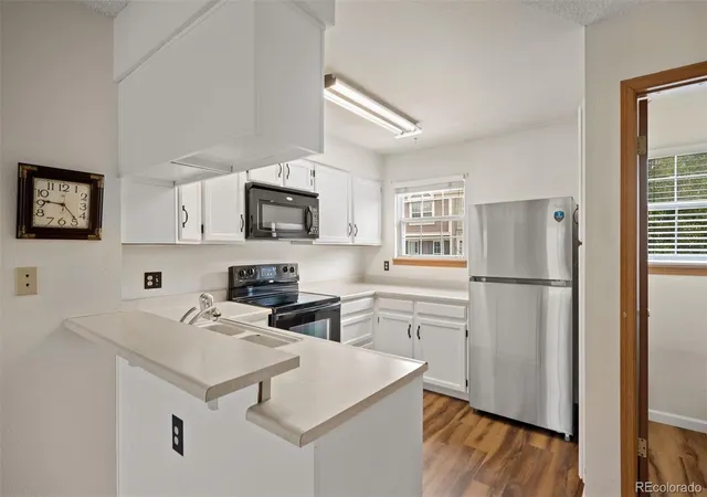 Photo 3 of Townhouse for sale at 1699 S Trenton St #115, Denver, CO 80231 | MLS# 9280486 | Listing updated on 2026-09-17