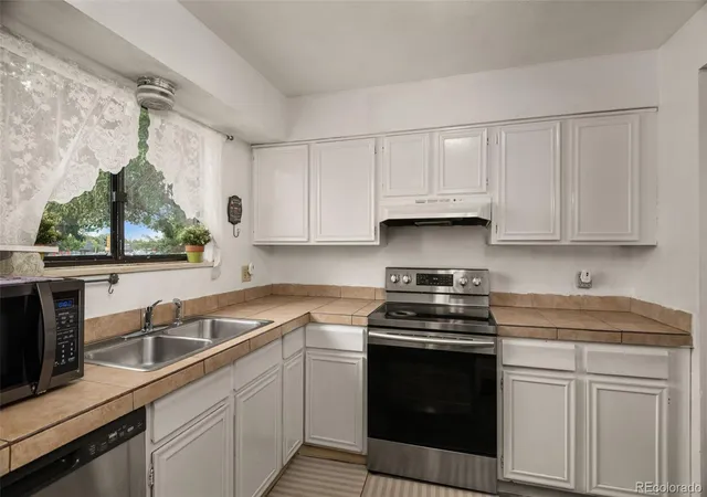 Photo 2 of Townhouse for sale at 14462 E Mississippi Ave #H, Aurora, CO 80012 | MLS# 4164913 | Listing updated on 2026-09-24