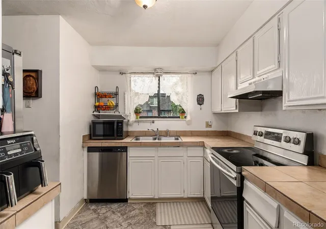 Photo 3 of Townhouse for sale at 14462 E Mississippi Ave #H, Aurora, CO 80012 | MLS# 4164913 | Listing updated on 2026-09-24