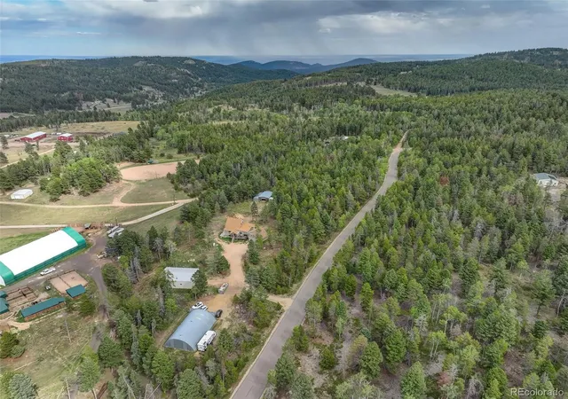 Photo 2 of Single family home for sale at 12090 S Ridge Rd, Conifer, CO 80433 | MLS# 5772785 | Listing updated on 2026-09-21