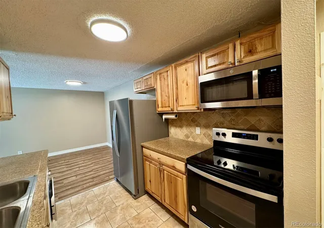 Photo 2 of Condo for sale at 7375 E Quincy Ave #207, Denver, CO 80237 | MLS# 8291271 | Listing updated on 2026-09-14
