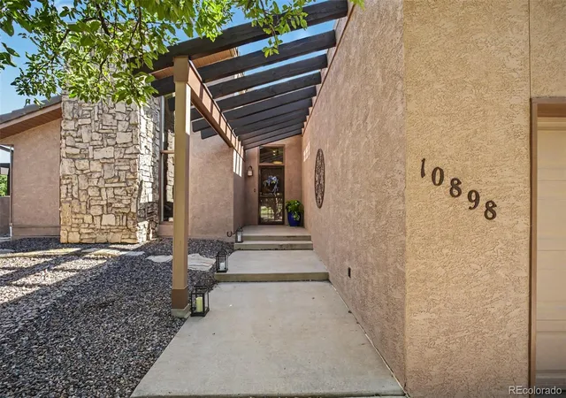 Photo 2 of Single family home for sale at 10898 Snow Cloud Trl, Littleton, CO 80125 | MLS# 3858033 | Listing updated on 2026-09-14