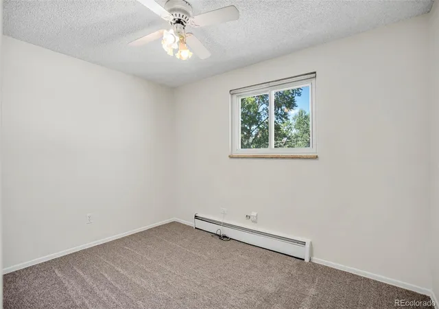 Listing Photo 2 - Condo for sale in building located at 4595 Everett Ct, Wheat Ridge, CO 80033 - Unit #