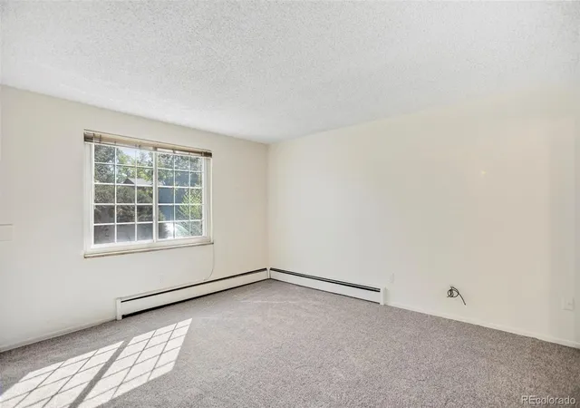 Photo 2 of Condo for sale at 4595 Everett Ct, Wheat Ridge, CO 80033 | MLS# 6137635 | Listing updated on 2026-09-07