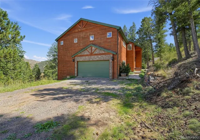 Photo 1 of Single family home for sale at 100 Elk Valley Way, Evergreen, CO 80439 | MLS# 9618749 | Listing updated on 2026-09-08