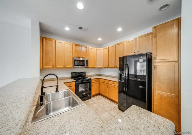 Photo 3 of Townhouse for sale at 1753 S Buchanan Cir, Aurora, CO 80018 | MLS# 6581588 | Listing updated on 2026-09-22