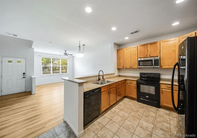 Photo 3 of Townhouse for sale at 1753 S Buchanan Cir, Aurora, CO 80018 | MLS# 6581588 | Listing updated on 2026-09-22