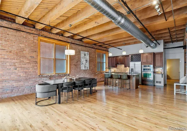 Listing Photo 3 - Condo for sale in building located at 1127 Auraria Pkwy, Denver, CO 80204 - Unit #302