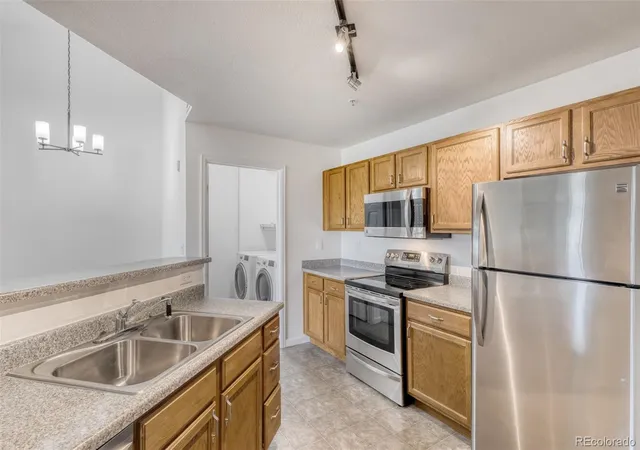 Photo 4 of Condo for sale at 5733 N Gibralter Way #3-306, Aurora, CO 80019 | MLS# 7934821 | Listing updated on 2026-09-15