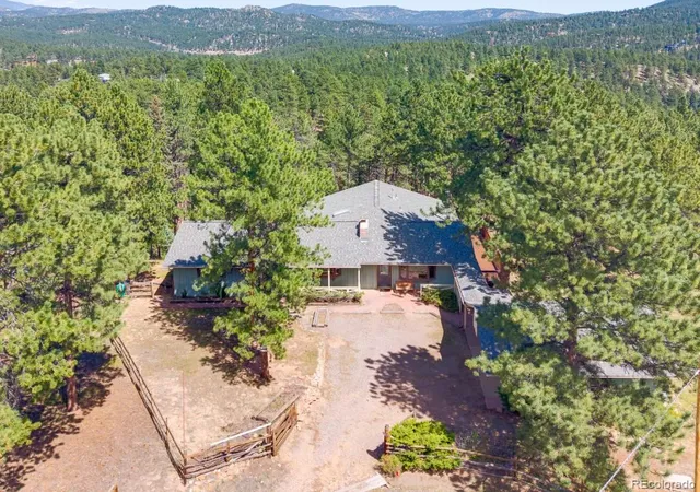 Photo 1 of Single family home for sale at 29203 & 29253 Lee Rd, Evergreen, CO 80439 | MLS# 8660264 | Listing updated on 2026-10-08