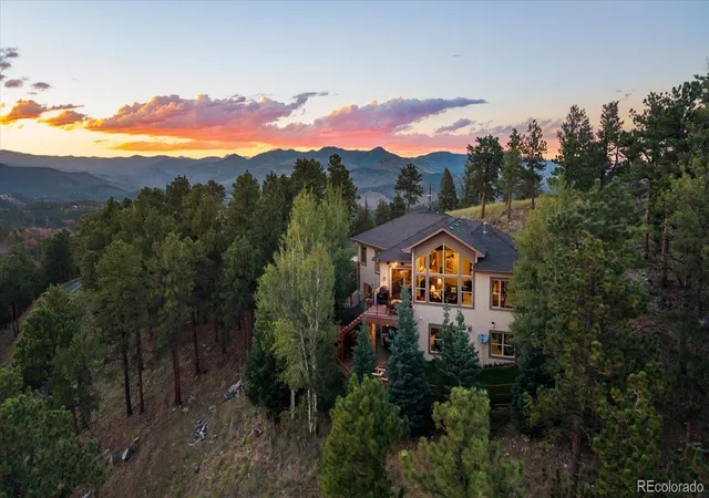Photo 1 of Single family home for sale at 1029 Blue Grass Trl, Evergreen, CO 80439 | MLS# 3209017 | Listing updated on 2026-10-08